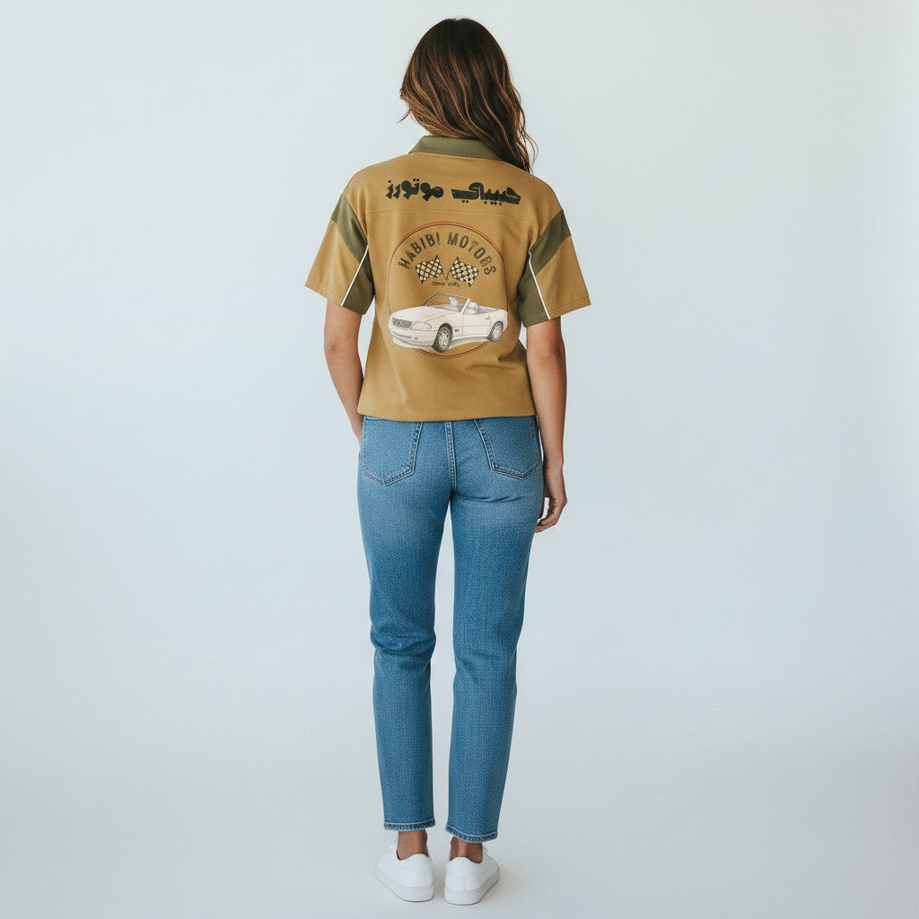 The Savage Mammoth unisex khaki and army green color block polo shirt with Habibi Motors graphic print on the back
